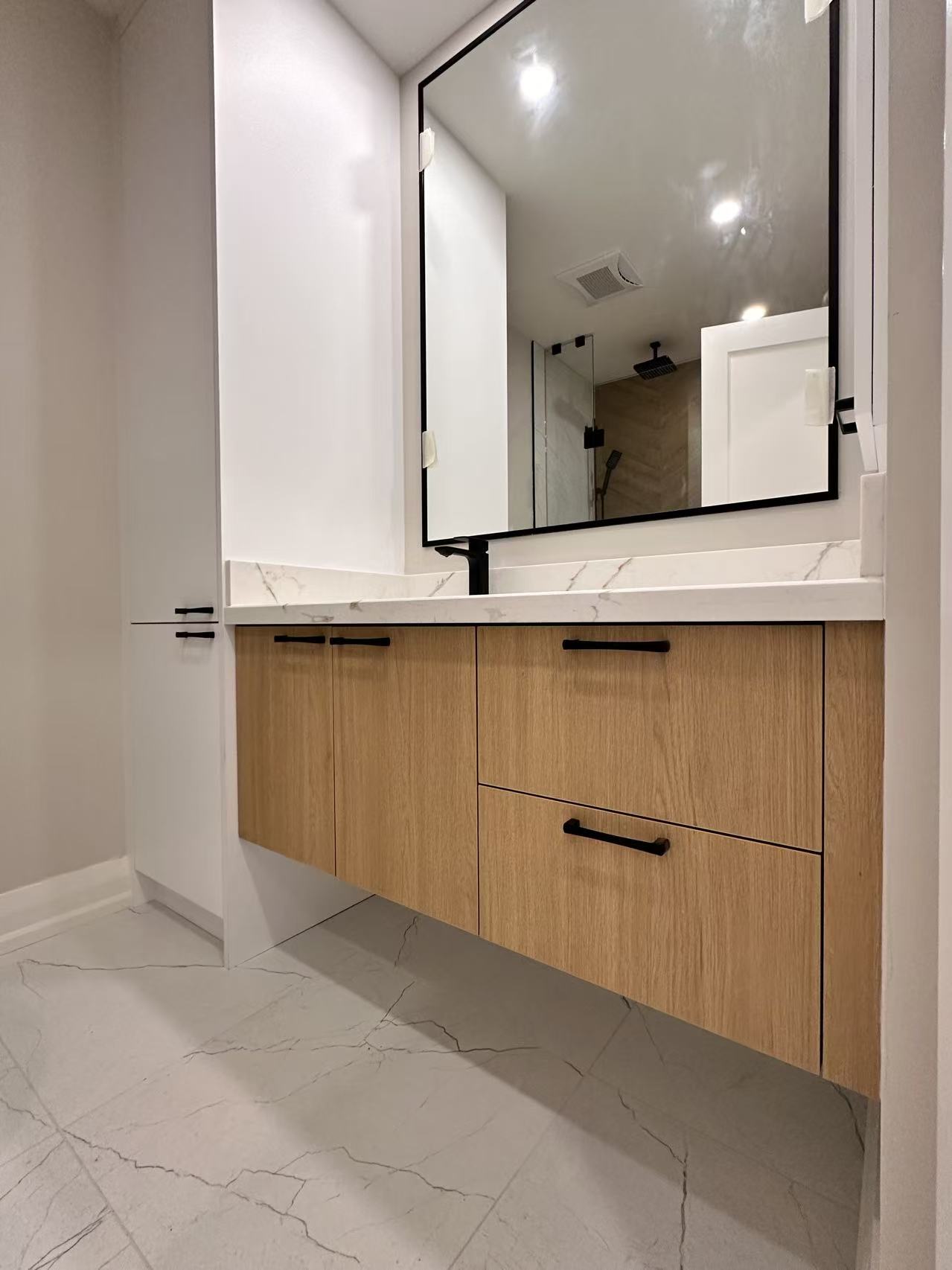 Light wood floating vanity