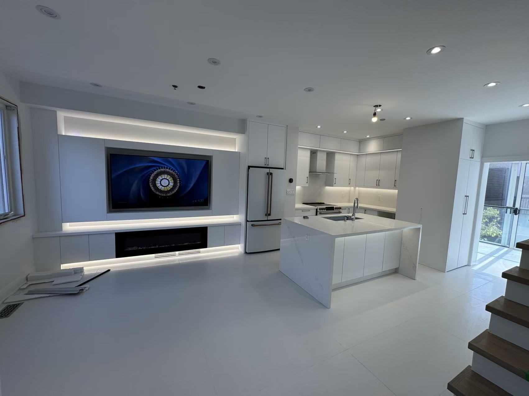 All white open concept entertainment wall