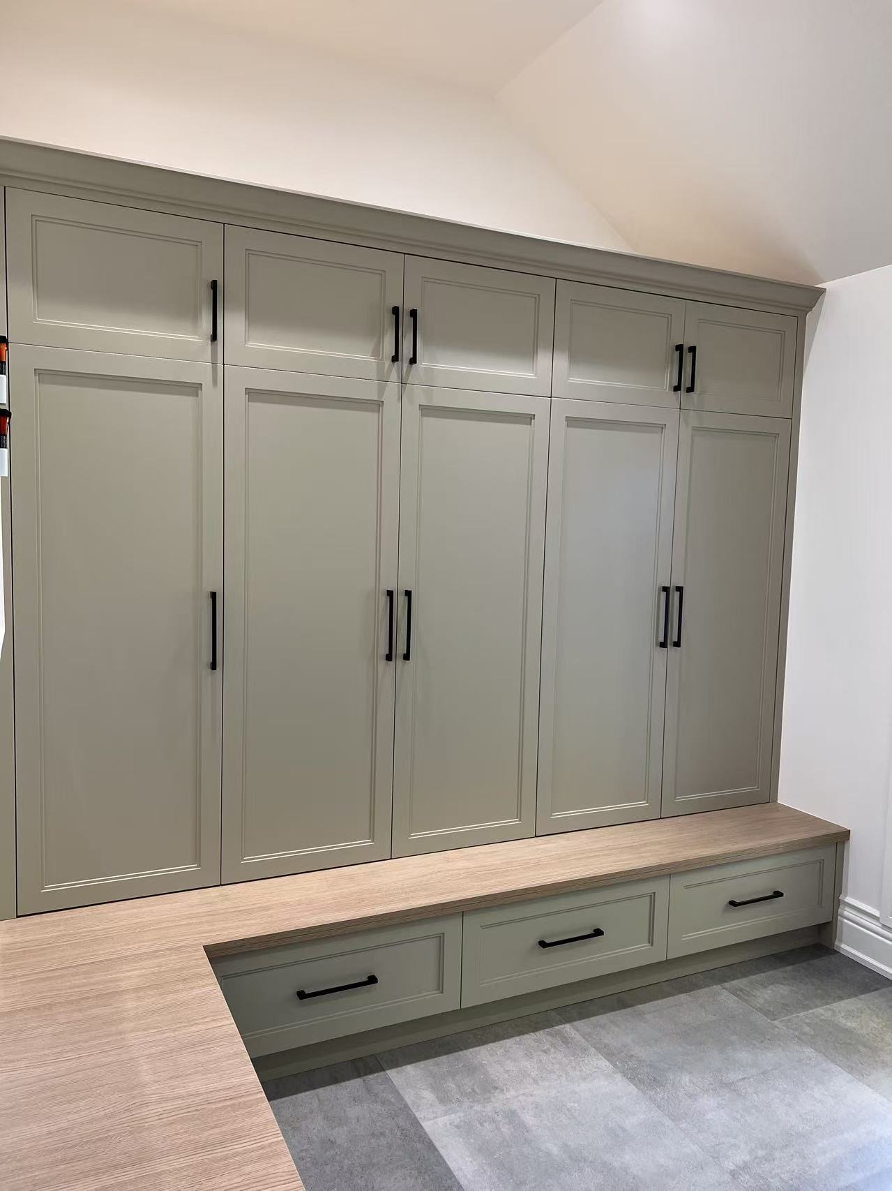 Sage green mudroom wide view